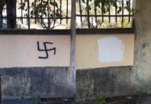 Un colpo di pennello e…zac. La svastica non c’è più. Il precedente